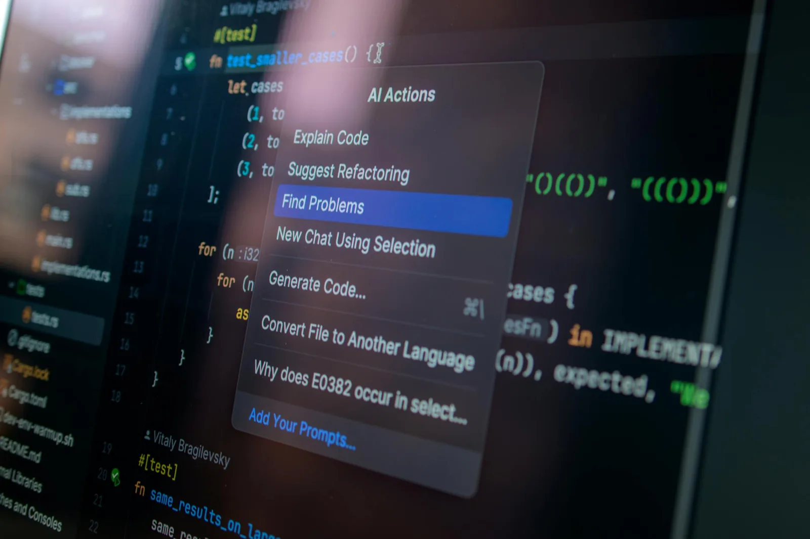 Detailed view of a computer screen displaying code with a menu of AI actions, illustrating modern software development.